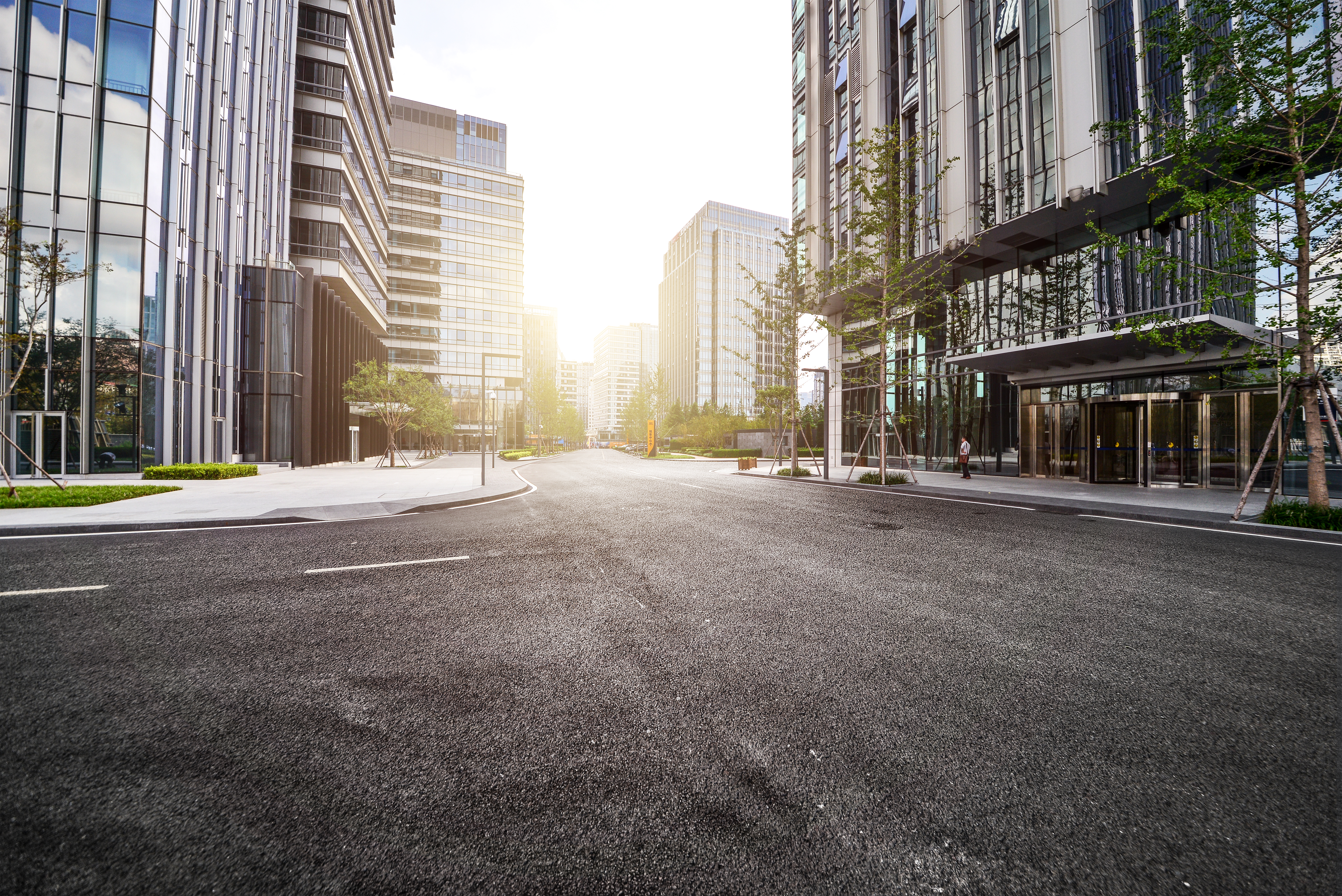 lonely-road-with-modern-buildings